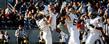 <p>Kent State players celebrate a touchdown.</p>