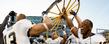 <p>Kent State players celebrate a victory and another to hold the Wagon Wheel in 2011.<br />
</p>