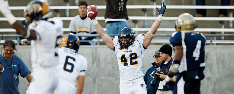 <p>A Kent State fullback celebrates his touchdown.<br />
</p>