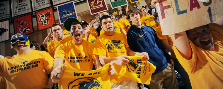 Kent State students cheer on the Golden Flashes during a home contest with the College of Charleston.