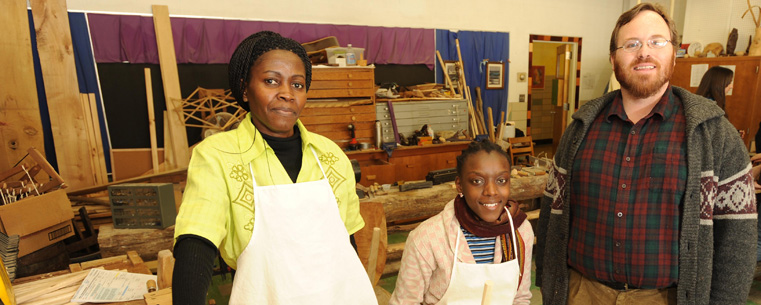 Naa Kai Tetteh, a teacher from Ghana, and Katia Melchiades, a teacher from Brazil, with Adam Kuhn, a teacher at the Spring Garden Waldorf School near Akron.