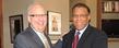 Kent State University President Lester A. Lefton (left) shakes hands with André Thornton (right), who was named the university's first President's Ambassador.