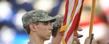 Members of the Army Reserve Officer Training Corps post the colors at a Kent State football game.