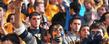 Fans of the Kent State Golden Flashes cheer on the team during a game against Cleveland State University.