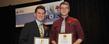 Kent State University graduate Jared Atkins and Kent State student Eric Johnston pose with their Real Heroes Awards after their presentation at the Bertram Inn in Aurora.