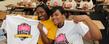 <p class=&quot;MsoNormal&quot;>Two women participating in the Women’s Football Clinic show off the T-shirts they received as part of the program.</p>

<br />
<br />