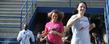 <p>Participants in the Women’s Football Clinic take to the field at Dix Stadium through a cloud of smoke just like the Kent State Golden Flashes football team as head football coach Darrell Hazell watches.<br />
</p>