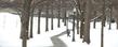 A Kent State student walks across the north part of campus on his way to class.