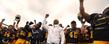 Coach Hazell and the Golden Flashes sing the KSU fight song after the football team's victory over Ohio University.