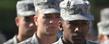 <p>Members of Kent State University's Army Cadet Corps stand at attention during the 2011 Veterans Day service held on Risman Plaza.</p>