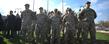 <p>Members of Kent State University's ROTC programs stand at attention during the 2011 Veterans Day service held on Risman Plaza.</p>