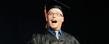 <p>A Kent State graduate reacts after receiving his diploma during morning commencement ceremonies in the Memorial Athletic and Convocation Center.<br />
<br />
</p>