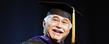 Kent State President's Ambassador Jose Feliciano addresses the audience attending the morning commencement ceremony in the Memorial Athletic and Convocation Center.