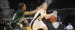 Flashes Guard Trisha Krewson looks for an opening during a MAC tournament game against Eastern Michigan.