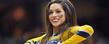 A member of the Kent State Dance Team performs during a time out at the MAC Tournament in Cleveland.