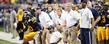 Head Coach Darrell Hazell and the team watch a field goal attempt in overtime, during the MAC Championship game at Ford Field, in Detroit.