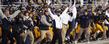 Head Coach Darell Hazell and the Kent State football team reacts to a last-second win, following a Central Michigan missed field goal attempt at Dix Stadium.