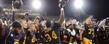 Kent State players celebrate on the field following a 24-21 win over visiting Central Michigan at Dix Stadium.