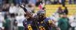 Kent State defensive back Sidney Saulter celebrates his interception in the end zone to end an Eastern Michigan threat in the fourth quarter at Dix Stadium. Teammate Calvin Tiggle joins the celebration.