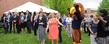 Guests attending the Sciences Building groundbreaking ceremony at Kent State University at Stark recognize an appearance by Flash, the official Kent State mascot, during the event.