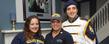 <p>A parent and her children, all Kent State alumni, pose for a photo in the Williamson Alumni Center. This year’s Parents’ and Family Day is Saturday, Sept. 24.</p>