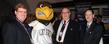 <p>Flash, the Kent State mascot, gathers for a photo with Kent Economic Development Director Dan Smith (left), Trustee Stephen Colecchi and Kent State Vice President for Research Grant McGimpsey in the Ohio Statehouse.</p>