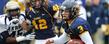 Kent State quarterback Spencer Keith runs in for a 4-yard touchdown, during the Golden Flashes 35-24 victory over the University of Akron.