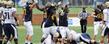 Kent State players celebrate a critical fumble recovery in the second half, against the University of Akron.