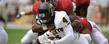 <p>Eric Adeyemi, gains some yards against the Crimson Tide.</p>