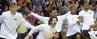 The Kent State bench erupts in celebration near the end of a hard-fought 70-68 victory over Buffalo in the MAC Tournament in Cleveland.