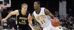 Kent State guard Carlton Guyton drives against his Western Michigan opponent during Kent State's 76-72 win in the quarterfinal game of the 2012 Mid-American Conference Tournament in Cleveland.