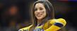 A member of the Kent State dance team celebrates following Kent State's 76-72 win over Western Michigan during the quarterfinal match up of the 2012 Mid-American Conference Tournament in Cleveland.