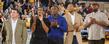 Members of the 2002 Elite Eight basketball team, including Antonio Gates and Demetric Shaw, reunite on the floor of the Memorial Athletic and Convocation Center, during a game against the College of Charleston.