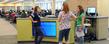 <p>Members of the instructional team discuss techniques at the information desk in the new Math Emporium, located on the second floor of the University Library.</p>