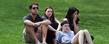 A group of students listen to emotional accounts of May 4, 1970, at Kent State while attending the 43rd annual May 4 Commemoration on the Commons near Taylor Hall.