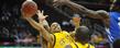 Kent State guard Michael Porrini cuts through a line of defenders for a field goal during a game last season.