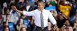 President Barack Obama waves to well-wishers in the MAC Center as he arrives for a speech Wednesday evening.