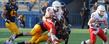 The Kent State defense smothers South Alabama quarterback C.J. Bennett.