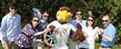 Kent State mascot Flash and the university’s RecycleMania team pose with the Braggin’ Wheel, won in last year’s informal recycling competition with the University of Akron.