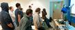 Students in Kent State's School of Digital Sciences listen attentively during a classroom lecture.