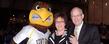 <p>President Lester A. Lefton and his wife, Linda, pose for a photograph with Kent State University mascot Flash during the Flashes Forever celebration in the Student Recreation and Wellness Center.<br />
</p>