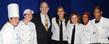 <p>President Lefton gathers with members of the Dining Services during the Flashes Forever celebration.</p>