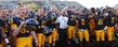 Darryl Hazell and the team serenade the band following his first-ever victory as Kent State Golden Flashes head coach.