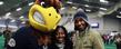 Upward Bound high school students pose with Flash, the Kent State mascot, at a lunch at the Kent State Field House.