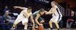 Kent State women's basketball players apply strong defensive pressure during a game at the Quicken Loans Arena, during the Mid-American Conference Tournament.