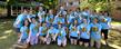 Dr. Lester Lefton poses with some of the 700 student volunteers that help freshman move into the residence halls.