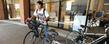 A student uses a bike he rented from the "Flash Fleet" on campus.