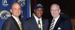 New Kent State head football coach Paul Haynes (center) poses for photos with Kent State Director of Athletics Joel Nielsen (left) and Kent State President Lester A. Lefton (right).