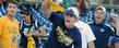 Kent State fans cheer on the team as they enter the dugout.