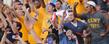 <p>Golden Flashes fans celebrate a touchdown.</p>